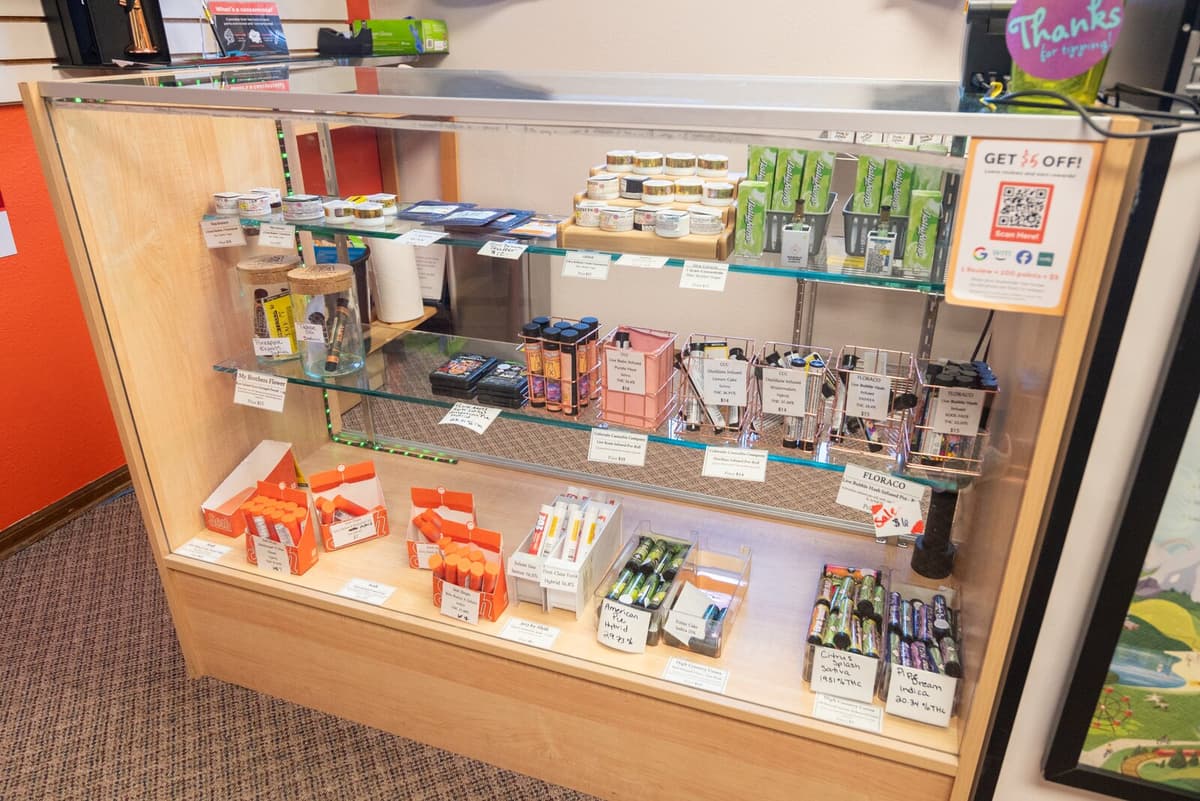Extensive medical menu: flower, cartridges, tinctures, capsules, edibles, and topicals.